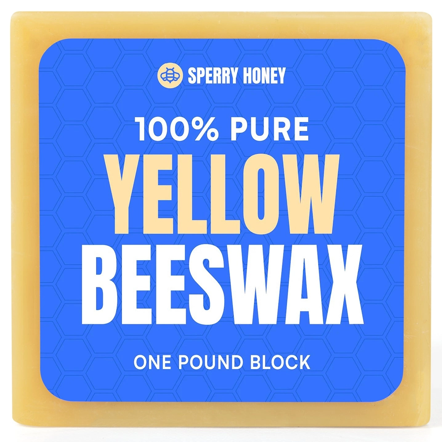 Block of 100% pure yellow beeswax with Sperry Honey branding on a blue label.